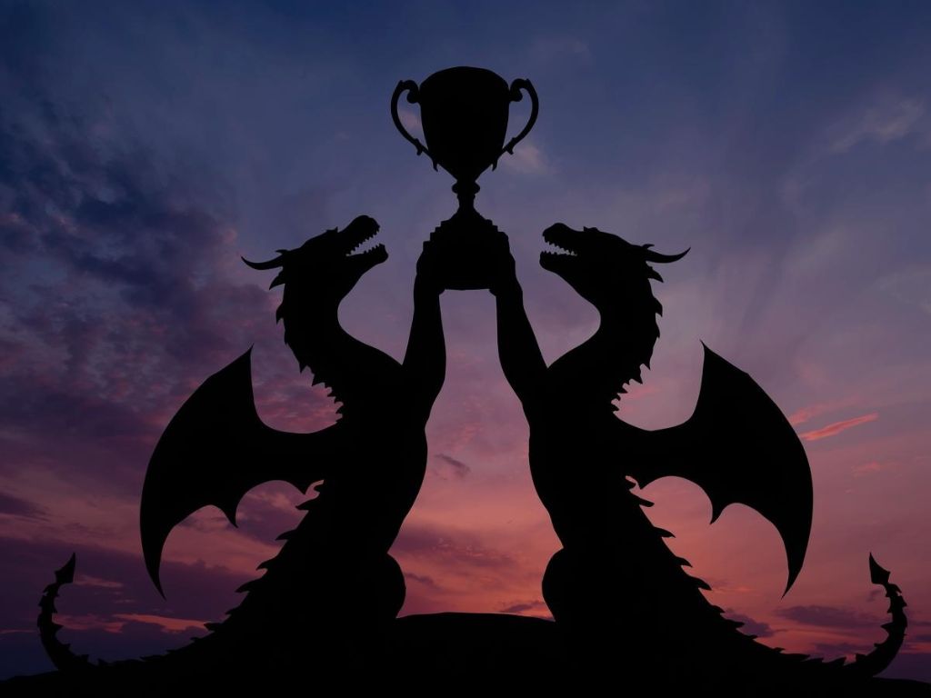 Two dragons raising a trophy together